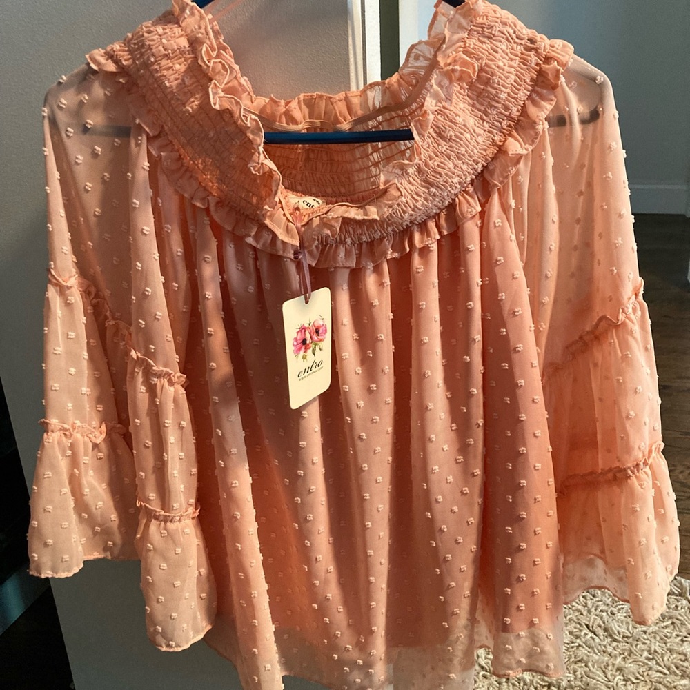 Entro peach colored blouse. Swiss dot print. Off shoulder. Flowy sleeves. Small